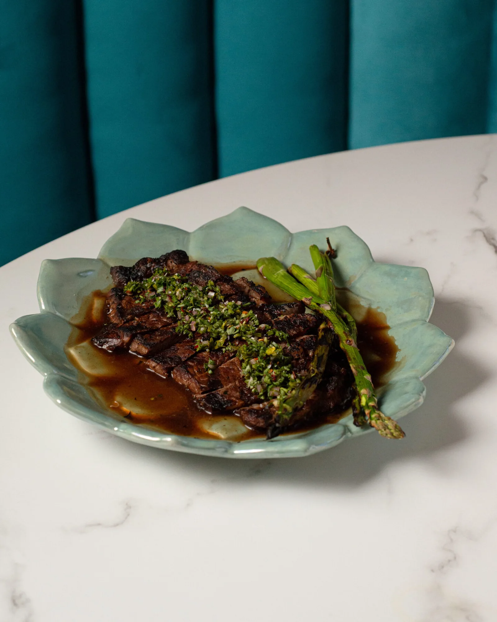 Spiced ribeye with chimichurri and grilled asparagus